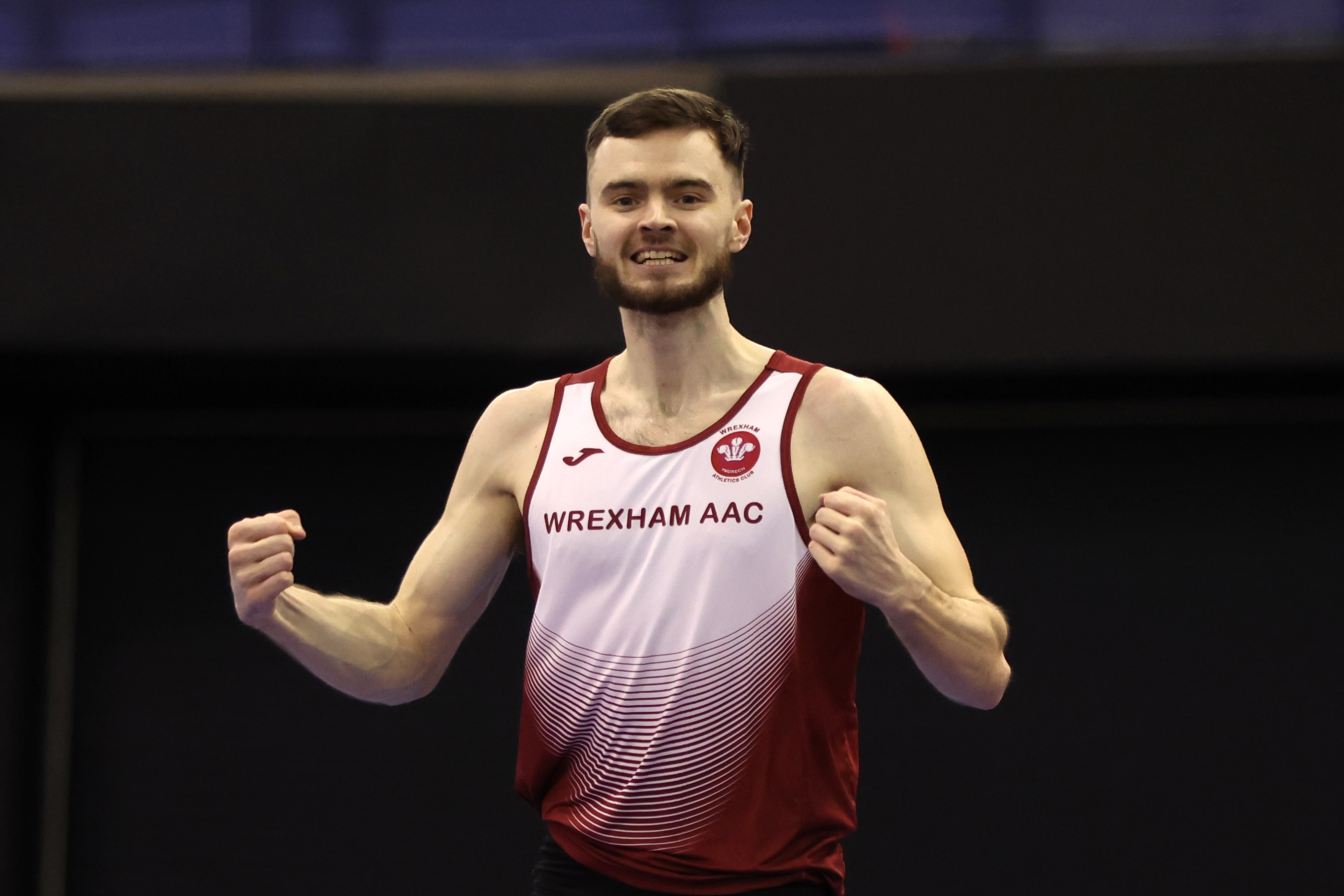 Thomas Walley celebrates winning bronze at the 2024 Microplus UK Athletics Indoor Championships